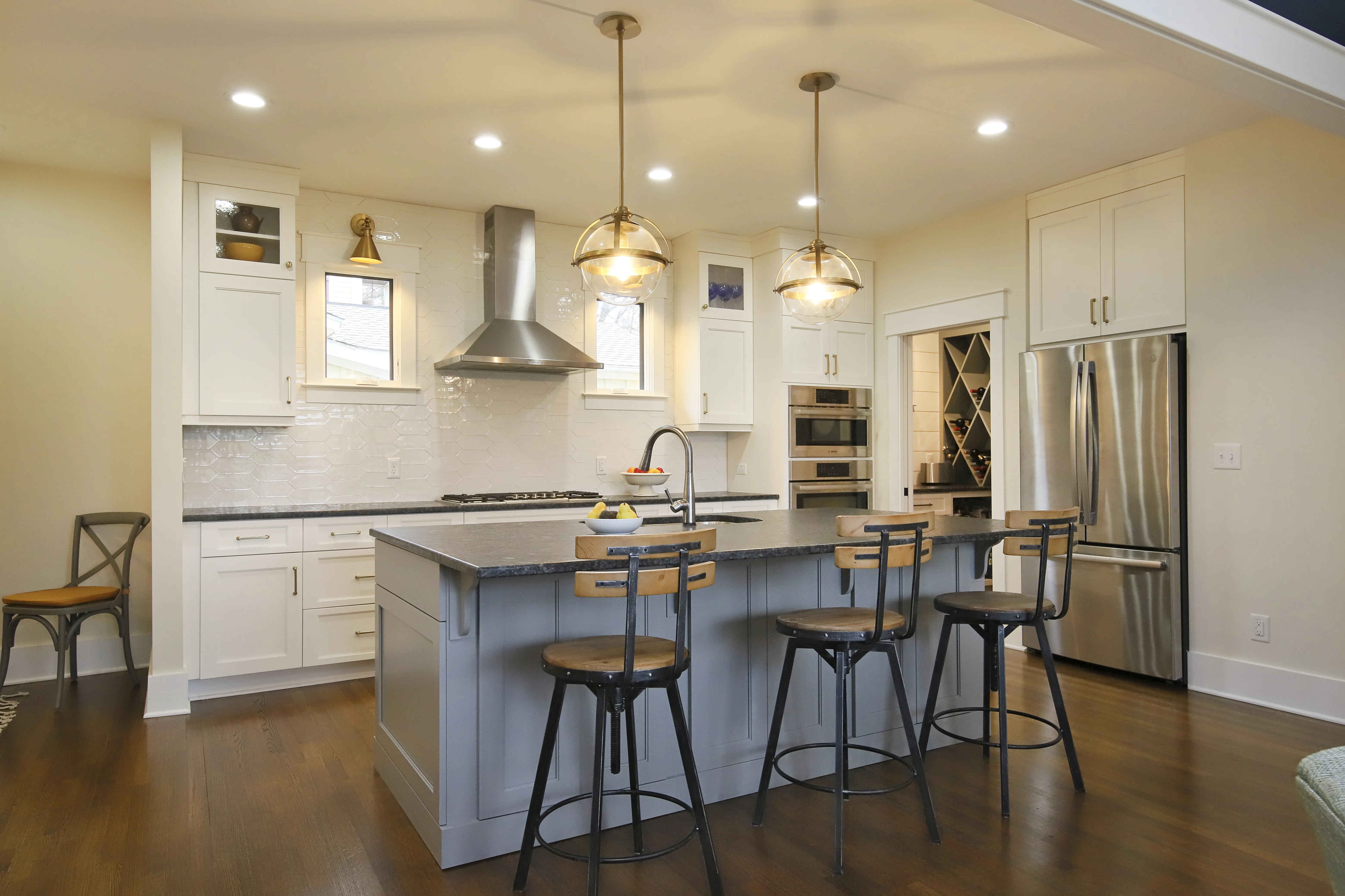 Completed Hutter kitchen renovation with white cabinetry and a generous island