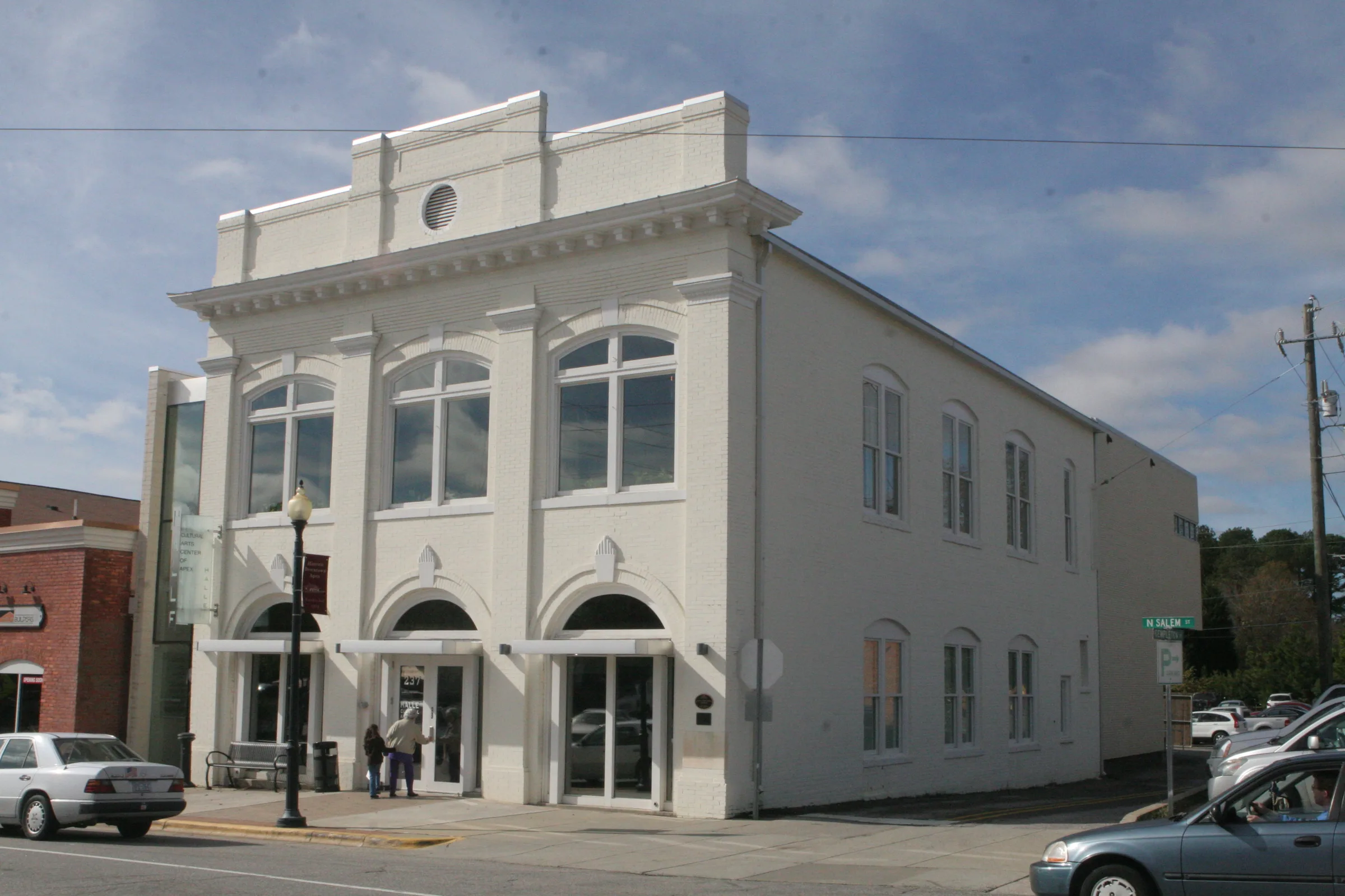 Historic 1912 Apex Town Hall with brick facade and white columns